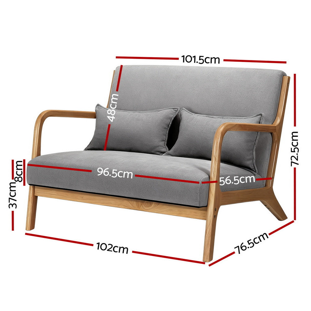 Grey fabric 2-seater sofa with natural wood open-arm frame and two lumbar cushions in living room setting