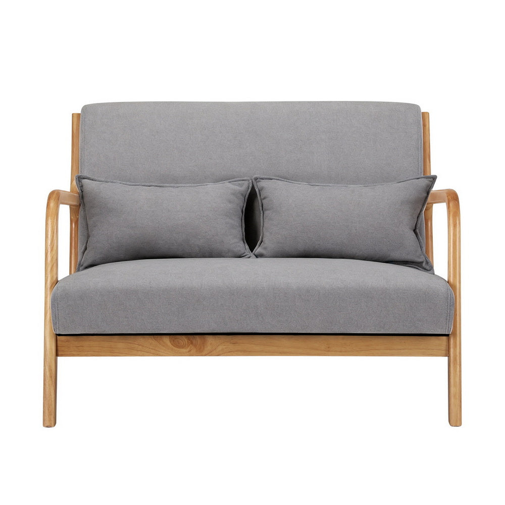 Grey fabric 2-seater sofa with natural wood open-arm frame and two lumbar cushions, front view on white background
