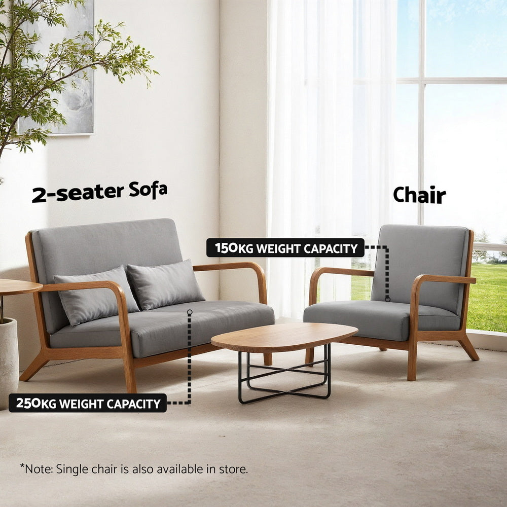 Grey 2-seater sofa and matching chair set labelled "2-seater Sofa" 250kg and "Chair" 150kg with wood coffee table