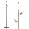 Silver 3-globe floor lamp with three white frosted glass shades on brushed nickel pole and round base, detail on right