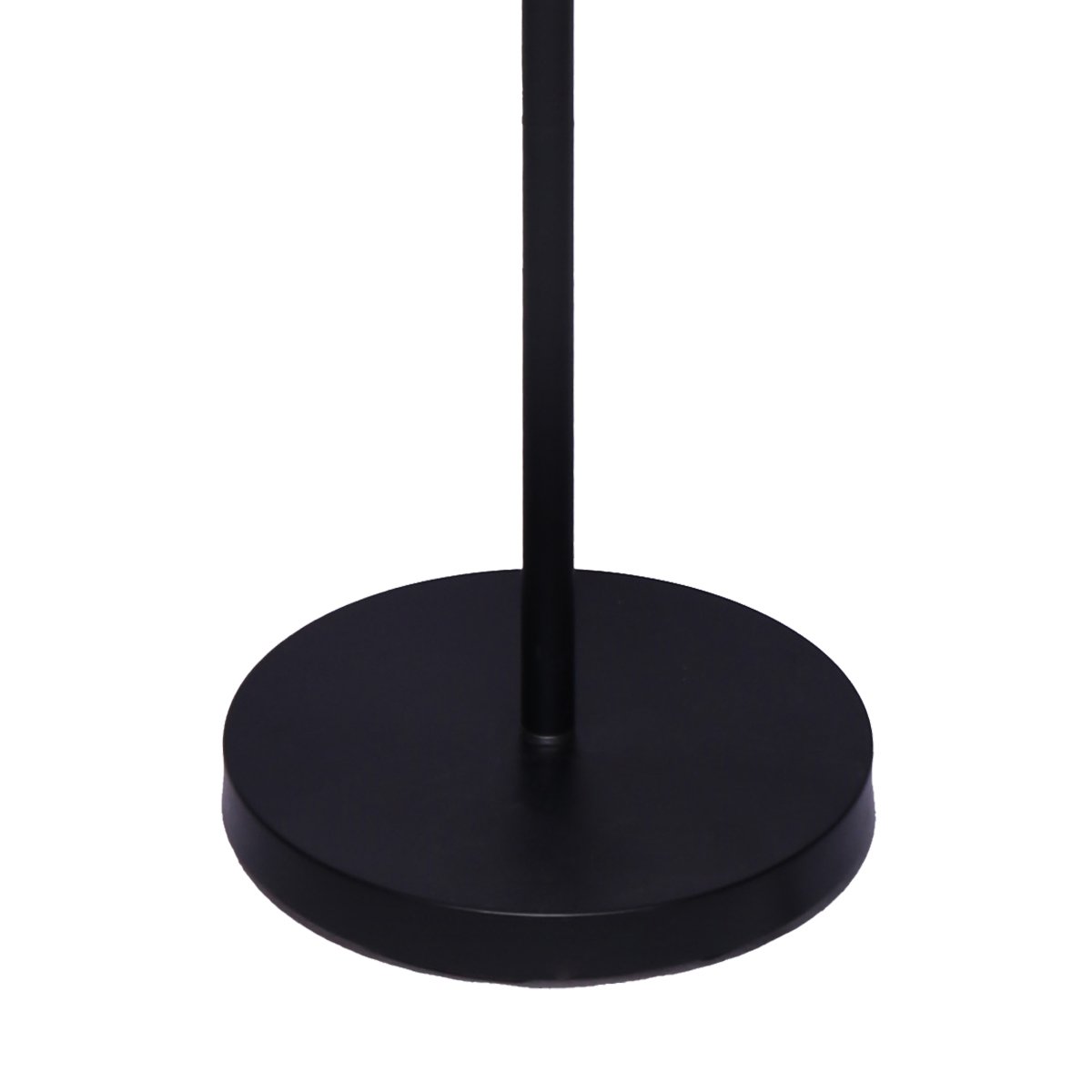 Close-up of round flat matte black floor lamp base with slim black pole on white background