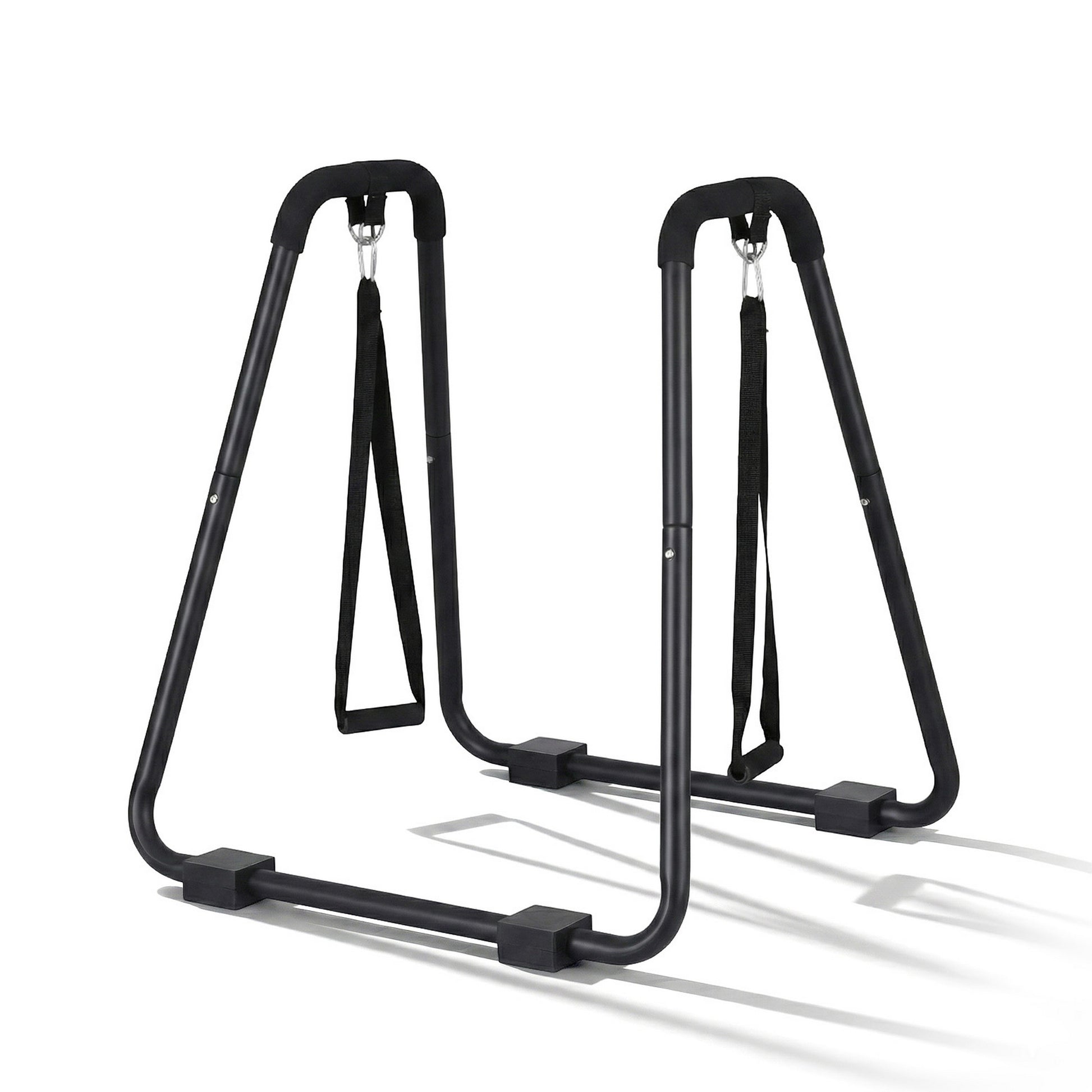 Black dip station parallel bars on white background with non-slip grip handles and dual hanging rings