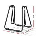 Side view of black steel dip station showing 97cm height and stable one-piece frame geometry