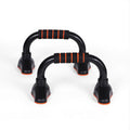 Front view of two black push-up stands with black foam grips and four orange-accented non-slip feet on white background