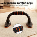 Single black push-up stand on rug with inset close-up of orange-striped high-density foam grip