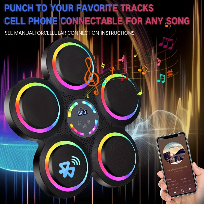 5-pad music boxing machine with rainbow LED rings and Bluetooth icon shown beside smartphone on colourful background