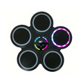 5-pad music boxing machine top-down view on light background with partial rainbow LED ring lit and central LED display