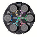 Round black music boxing machine with 6 grey strike pads and multicoloured LED lights on white background, top-down view