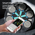 Hand holding smartphone near wall-mounted circular boxing machine with blue LED lights, text Smart Interconnection