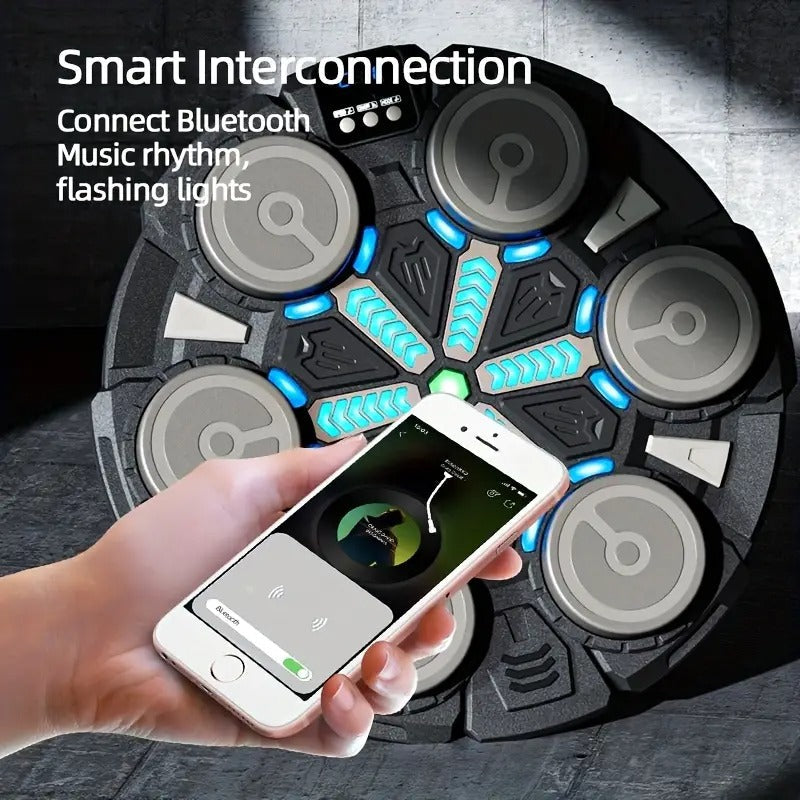Hand holding smartphone near wall-mounted circular boxing machine with blue LED lights, text Smart Interconnection