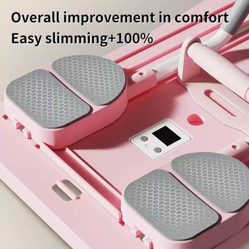 Close-up of pink exercise board foot pads showing two grey hexagonal foam elbow pads and small digital counter display