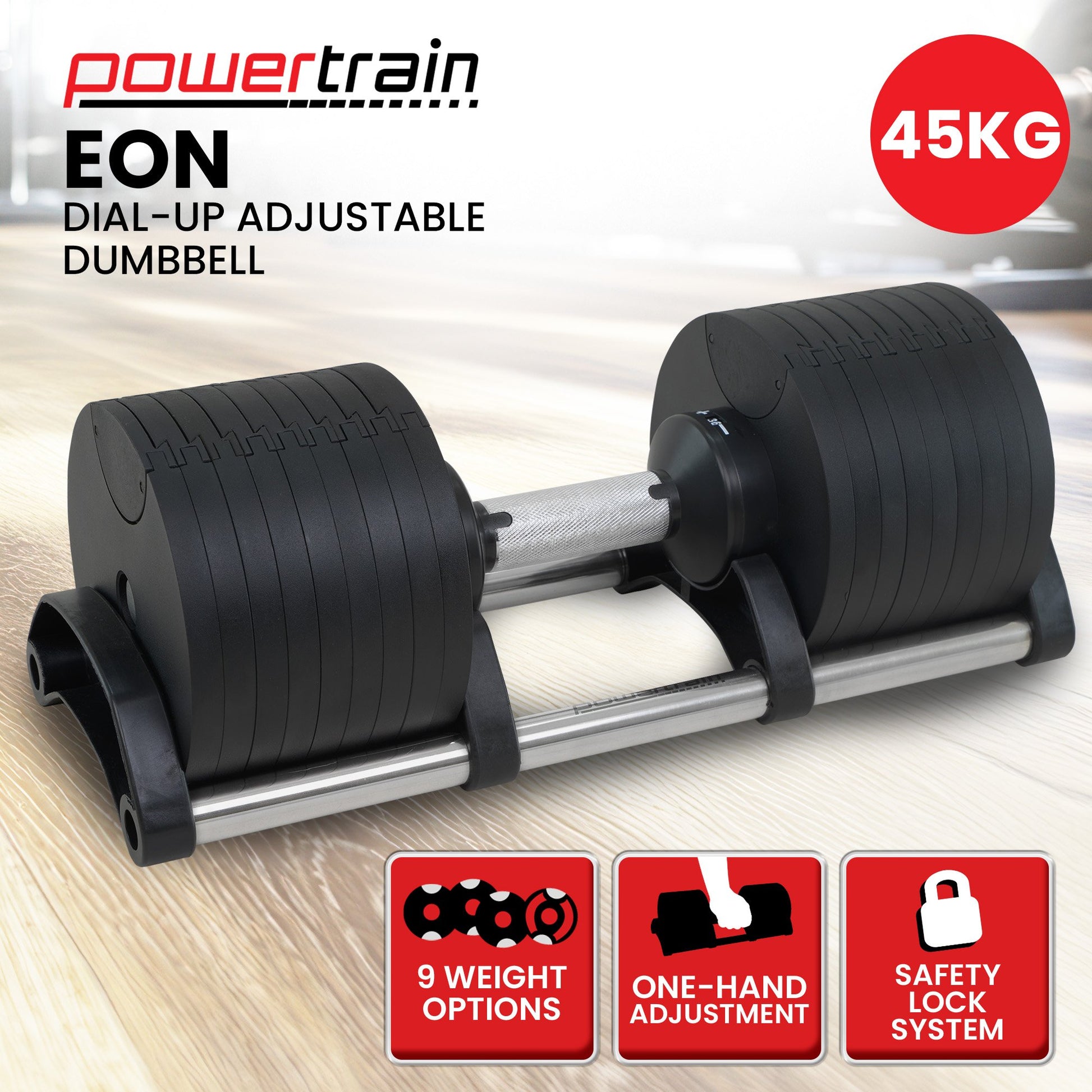 Powertrain EON 45kg dial-up adjustable dumbbell pair on light wood floor with powertrain branding and feature badges