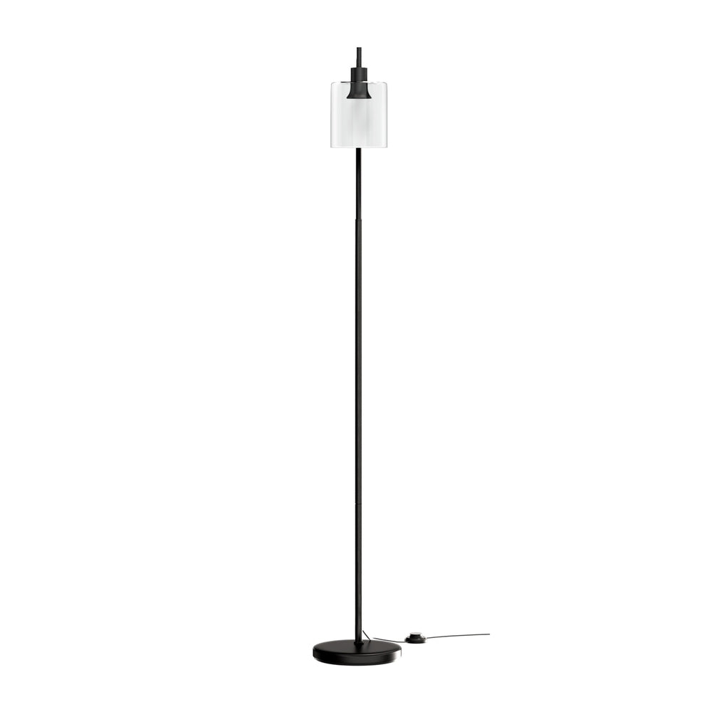Black floor lamp with slim straight pole, clear cylindrical glass shade and round base on white background