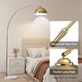 Gold arc floor lamp in bedroom with callouts: Retractable Metal Pole close-up and Flexible Lamp Head gold swivel fitting