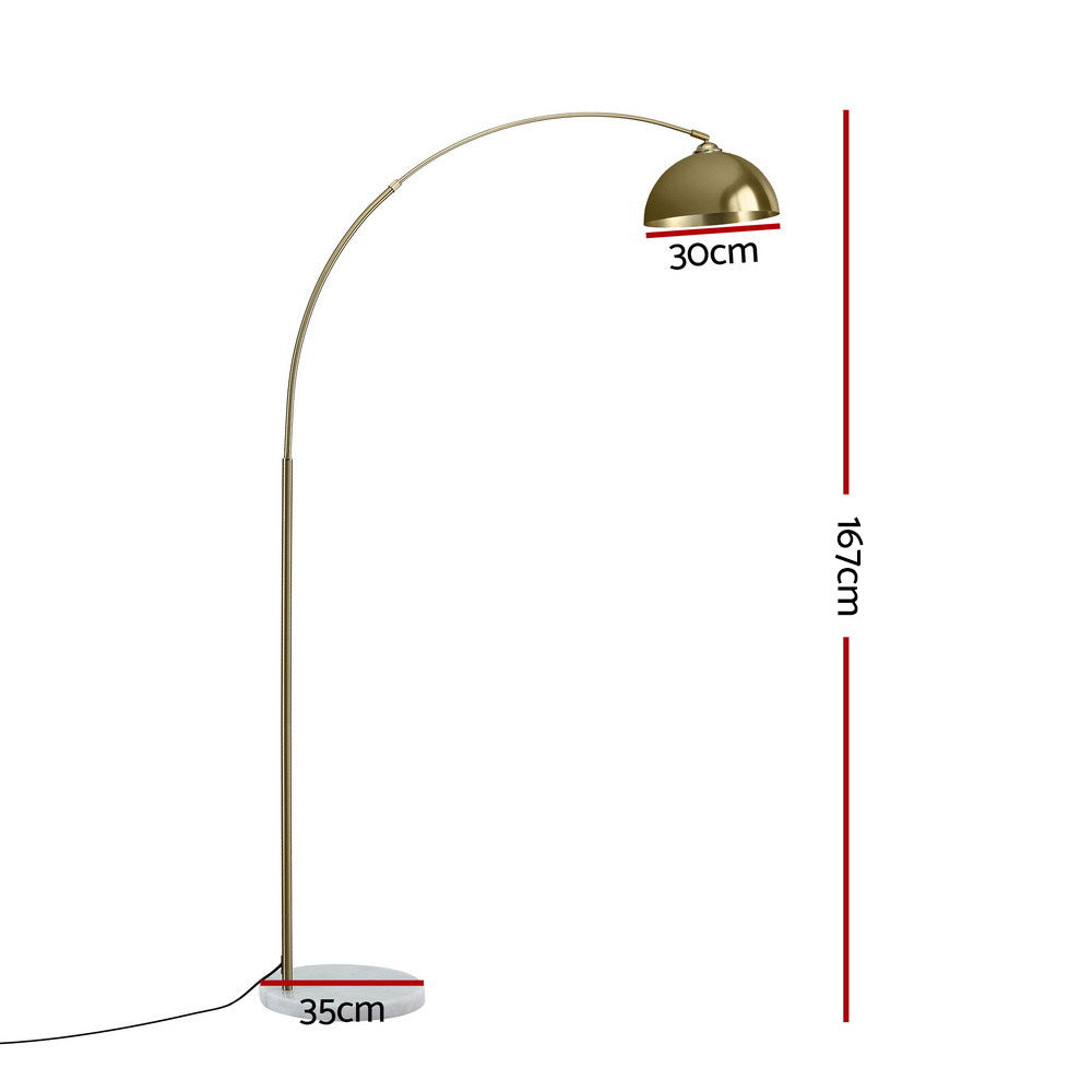 Arc floor lamp with large gold dome shade and white marble base, with detail view of shade interior from below
