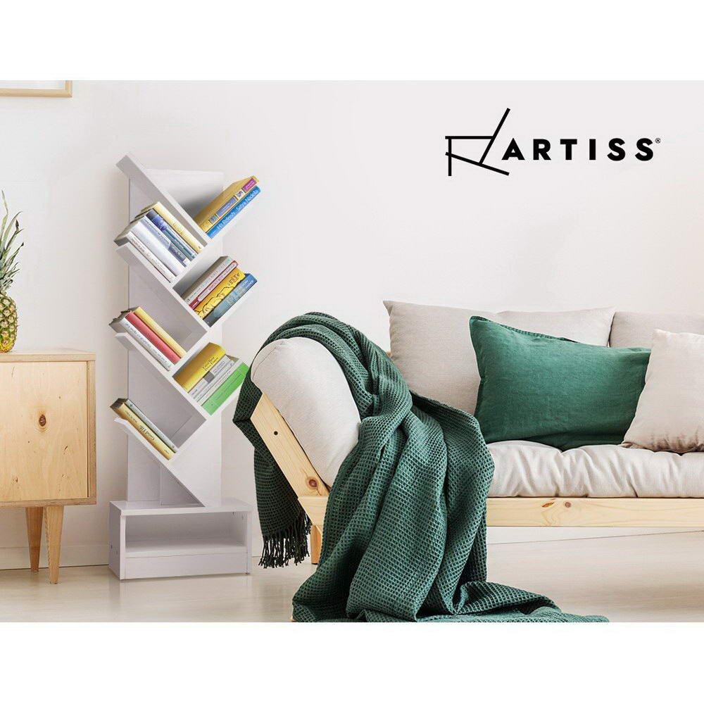 Artiss white 7-tier tree bookcase filled with colourful books in Scandinavian living room with green throw and wood sofa