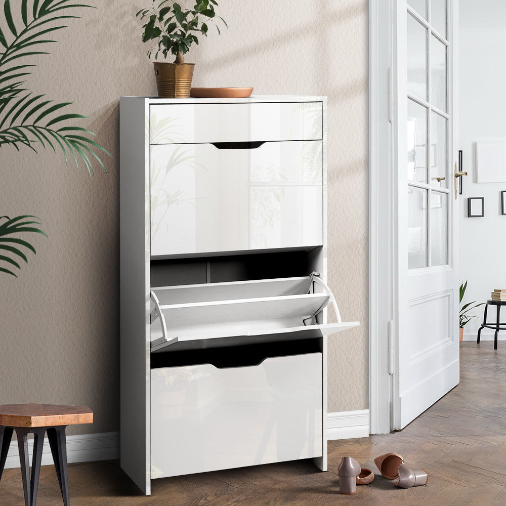 Artiss white gloss flip-down shoe cabinet in hallway with middle compartment door open, plant on top