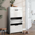 Artiss white gloss flip-down shoe cabinet in hallway with middle compartment door open, plant on top