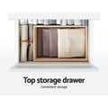 Artiss gloss shoe cabinet top drawer open showing folded linens and fabric items inside