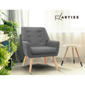 Artiss dark grey fabric armchair with button-tufted back and wood legs, lifestyle shot with plants, curtains and side table