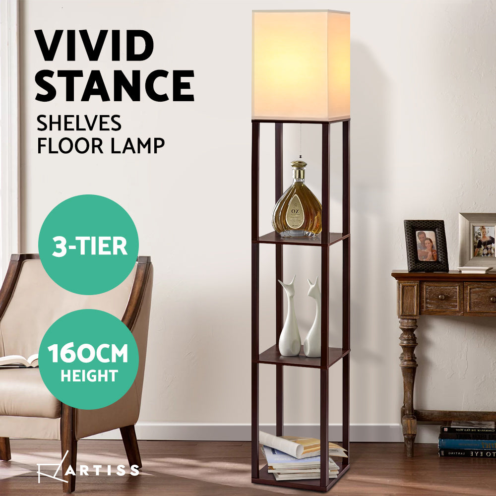 Artiss 3-tier walnut shelf floor lamp with lit white shade, 160cm height, shown with decor items and armchair in room setting