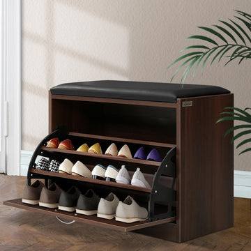 Artiss walnut shoe bench with black PU cushion and open flip-down door showing three shelves with shoes