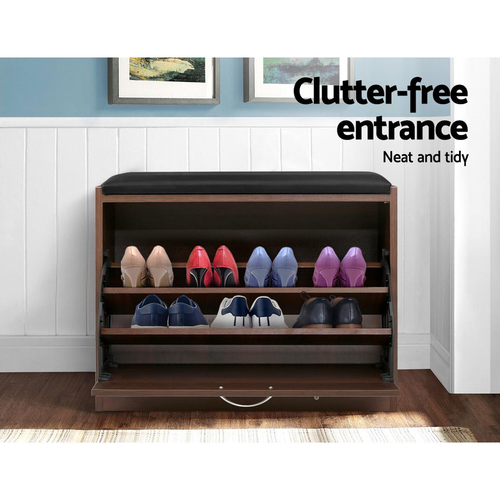 Artiss walnut shoe bench with flip-down door open showing heels and flats on shelves in entrance hallway setting