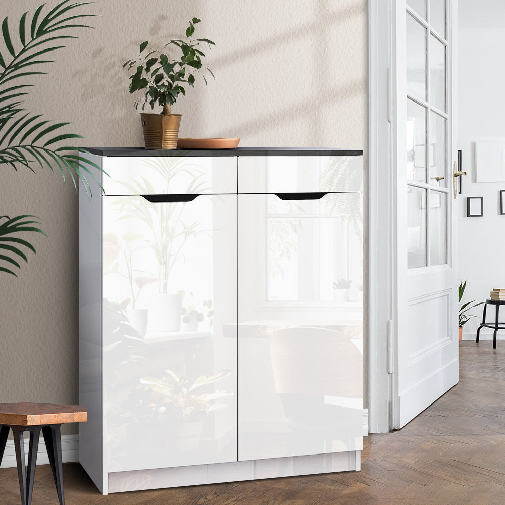 Artiss shoe cabinet 2-door high-gloss white with dark top in hallway with plant near white French door