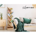 Artiss natural wood tree bookshelf filled with books in Scandinavian living room with sofa and timber sideboard