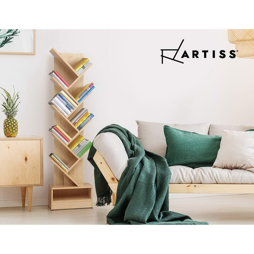 Artiss natural wood tree bookshelf filled with books in Scandinavian living room with sofa and timber sideboard