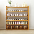 Wide natural bamboo 5-tier shoe rack fully loaded with colourful sneakers, flats and heels in room setting