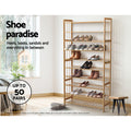 Bamboo 9-tier shoe rack loaded with heels boots and sandals in lifestyle setting with up to 50 pairs capacity badge