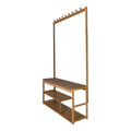 Bamboo hall coat rack with diagonal hooks on upright, padded fabric bench seat and two lower shoe shelves, angle view