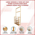 Bamboo hat coat stand and shoe rack features infographic with four callout circles on product detail