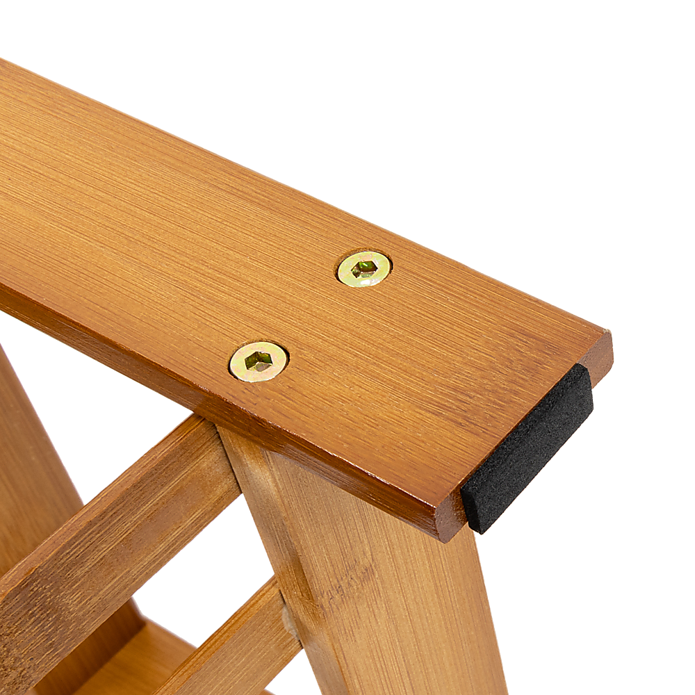 Close-up of bamboo shoe bench leg base showing screws and black rubber anti-slip foot pad detail