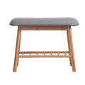 Bamboo shoe bench with grey cushion, front view on white background showing slatted shelf and legs