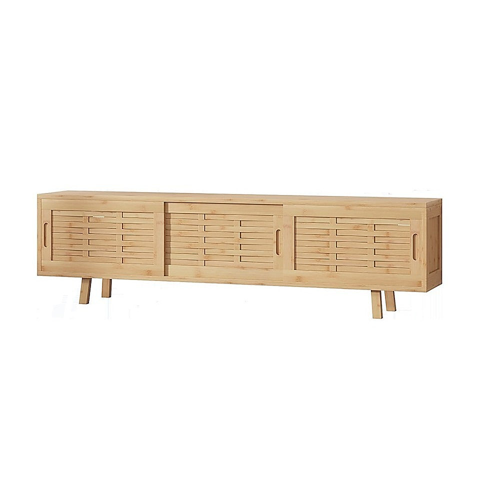 Natural bamboo TV unit angle view on white three sliding slatted doors with recessed handles on angled bamboo legs