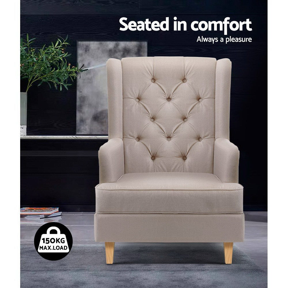 Beige linen fabric tufted wingback chair front view in dark room with plant, 150KG max load badge, text: Seated in comfort