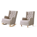 Two beige fabric tufted wingback chairs side by side on white background, left on rocking legs and right on straight legs