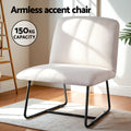 Beige linen armless accent chair with black sled base in sunny room, 