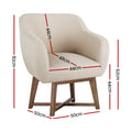 Beige barrel armchair feature detail: 17cm seat depth, smooth round corners, criss-cross solid rubber wood base close-up