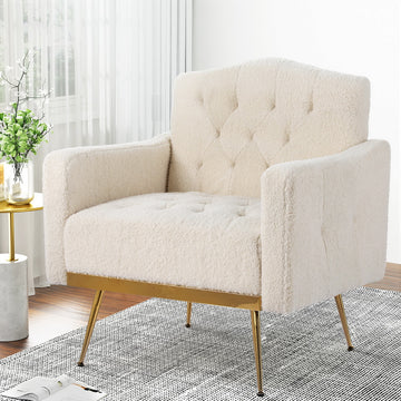 Cream teddy button-tufted armchair with gold metal legs in lifestyle room beside marble side table and sheer curtains