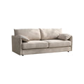 Beige plush 3-seater sofa with voluminous cushions and two throw pillows on white background