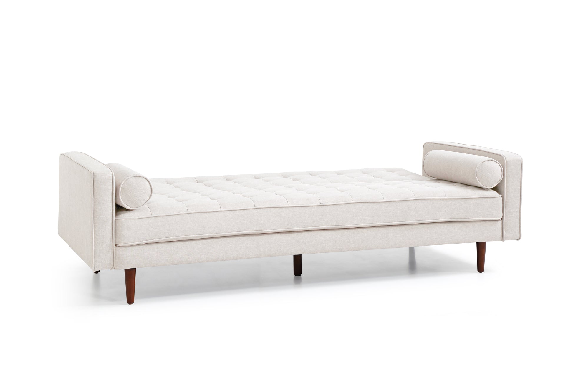 Beige velvet sofa bed in flat bed position at right angle view showing sleeping surface and armrests
