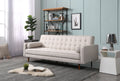 Beige velvet tufted sofa bed in lifestyle room scene in upright sofa position with scatter cushions