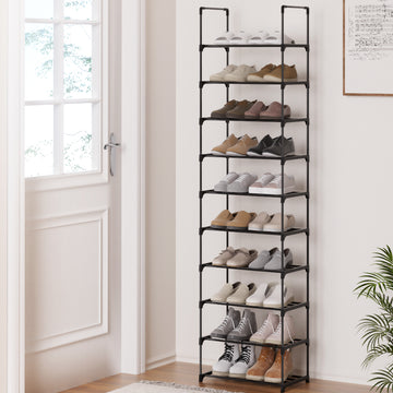 Black 10-tier narrow shoe rack loaded with shoes in lifestyle hallway beside front door and window