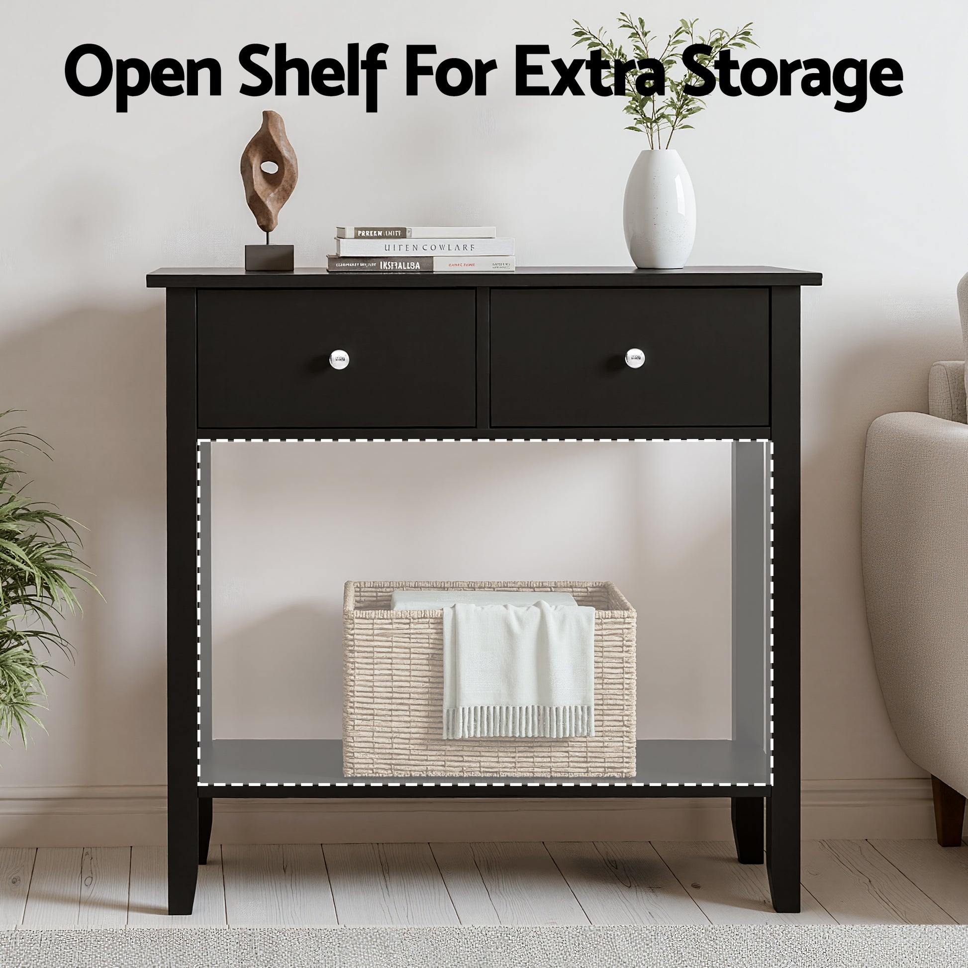 Black 2-drawer console table with text "Open Shelf For Extra Storage", lower shelf holding rattan basket with white throw