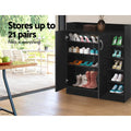 Black shoe cabinet both doors open revealing 4 internal shelves loaded with shoes, up to 21 pairs