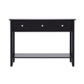 Black console table with three drawers, chrome knobs and lower shelf, front view on white background