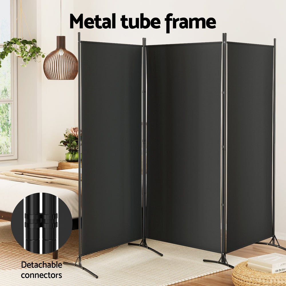 Black 3-panel fabric room divider metal tube frame in bedroom lifestyle with detachable connectors close-up